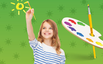 Girl painting yellow sun with a paint brush with a paint palette in the background